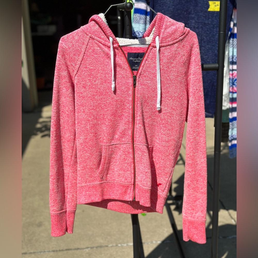 American Eagle pink zip up sweatshirt.